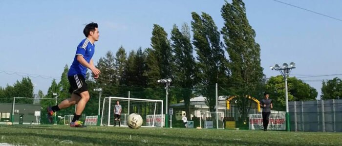 futsal player kicking a ball