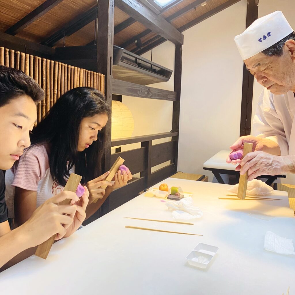 two Japanese kids making matcha